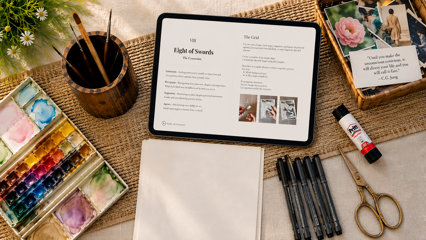 Tablet displaying a document on a table with art supplies including watercolor set, pens, and scissors. Play Patterns workbook interior – tarot framework for emotional clarity and reflection